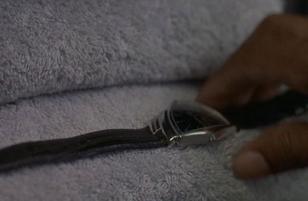 Will Smith getting the Hamilton Ventura from his locker in the movie Men in Blac