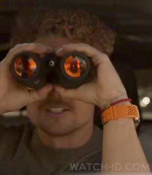 Billy Magnussen wears a Jacob & Co. Epic X Skeleton watch with orange details and orange strap in The Audacity.