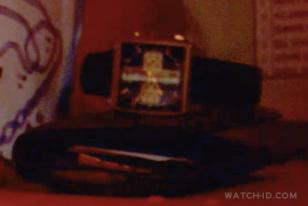 A TAG Heuer Monaco can just be seen laying on top of a wallet in Speed Racer's l