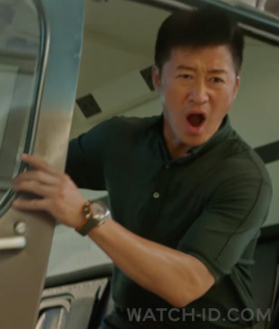 Based on the first trailer for the film, it looks like Wu Jing wears a grey and orange Omega Seamaster Planet Ocean in Meg 2: The Trench (2023).